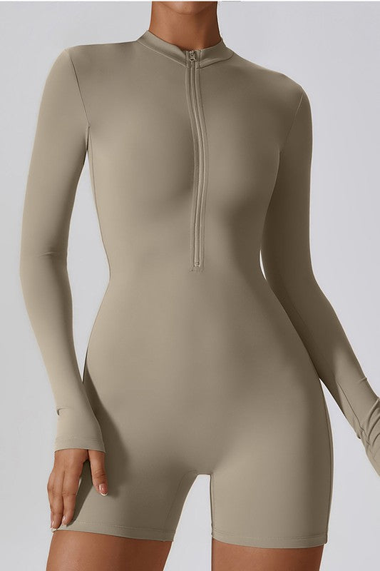 Zip Into Comfort: Long-Sleeve Solid Sports Jumpsuit – Perfect for Yoga, Fitness, and Beyond!