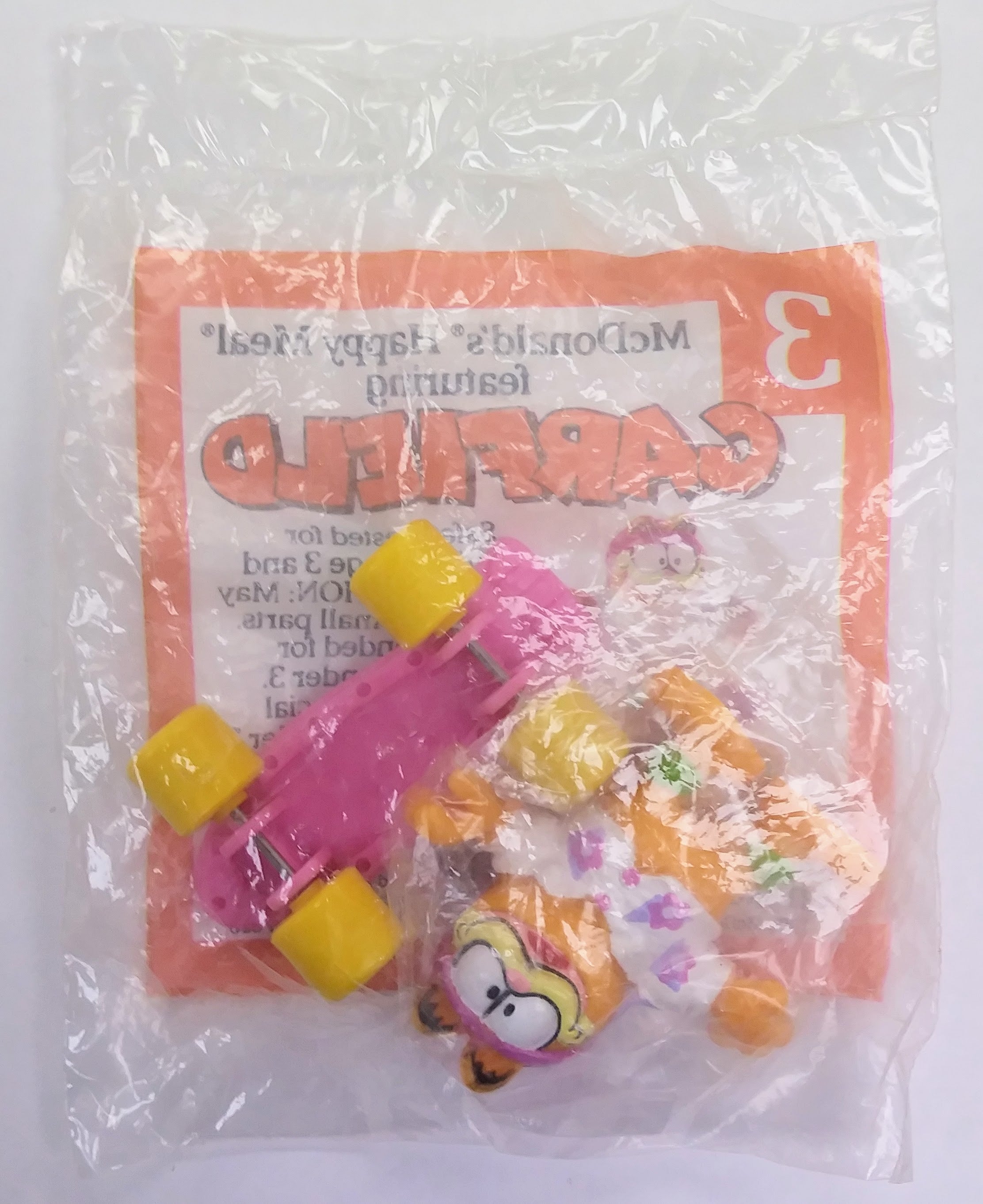 McDonald&amp;#39;s Happy Meal toy - Garfield on skateboard (Bagged)