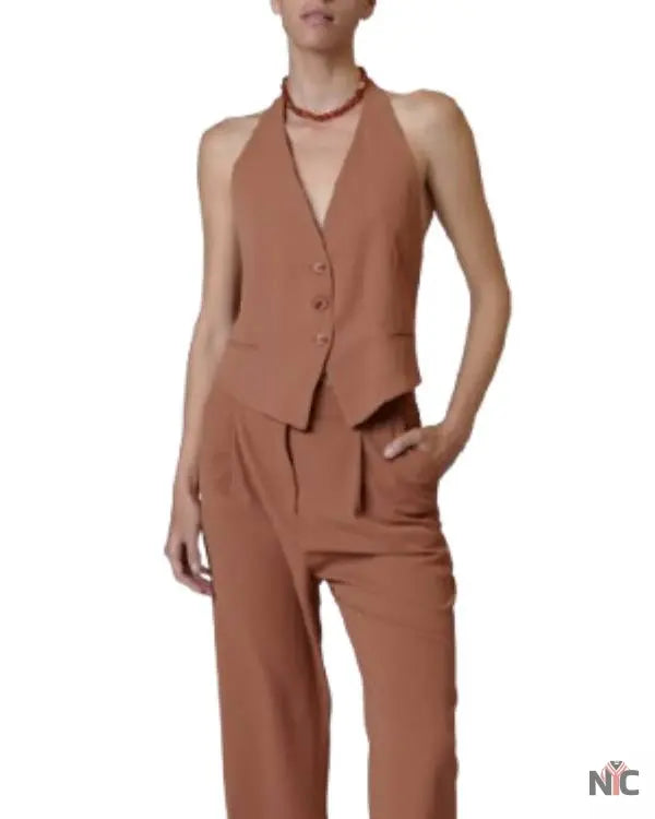 And Just Like That Seema Patel Brown Vest