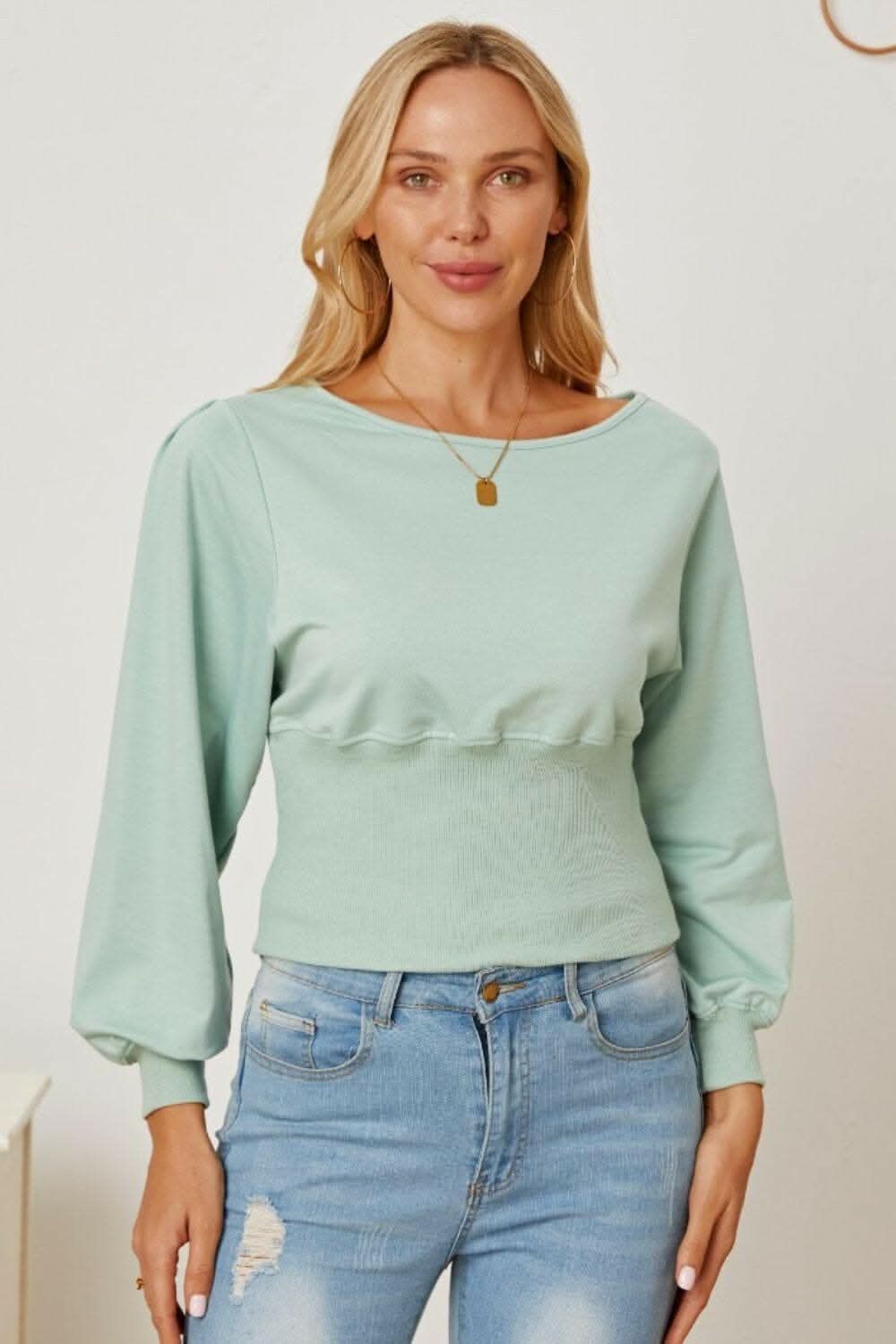 Chic boat neck blouse with elegant sleeves