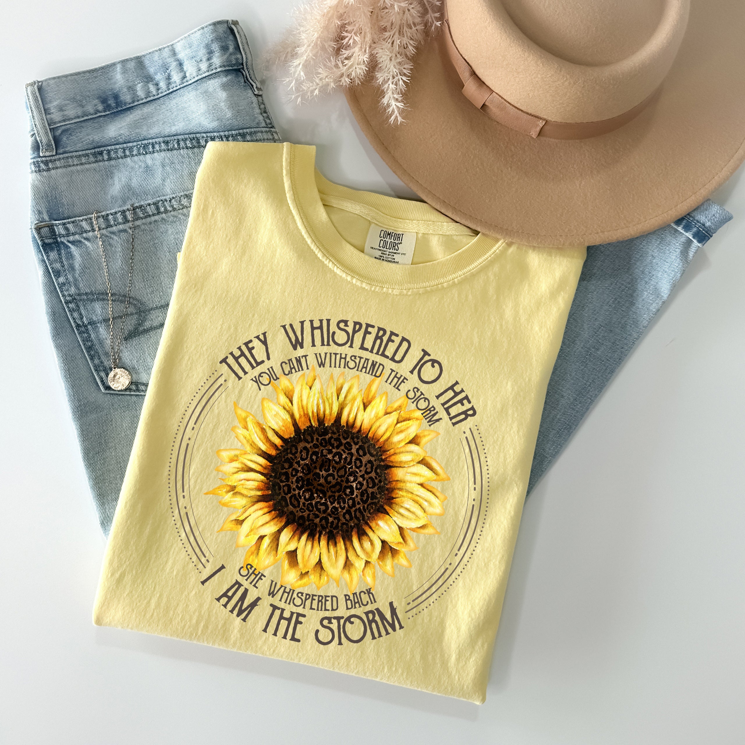 THEY WHISPERED TO HER YOU CAN&amp;#39;T WITHSTAND THE STORM GRAPHIC TEE