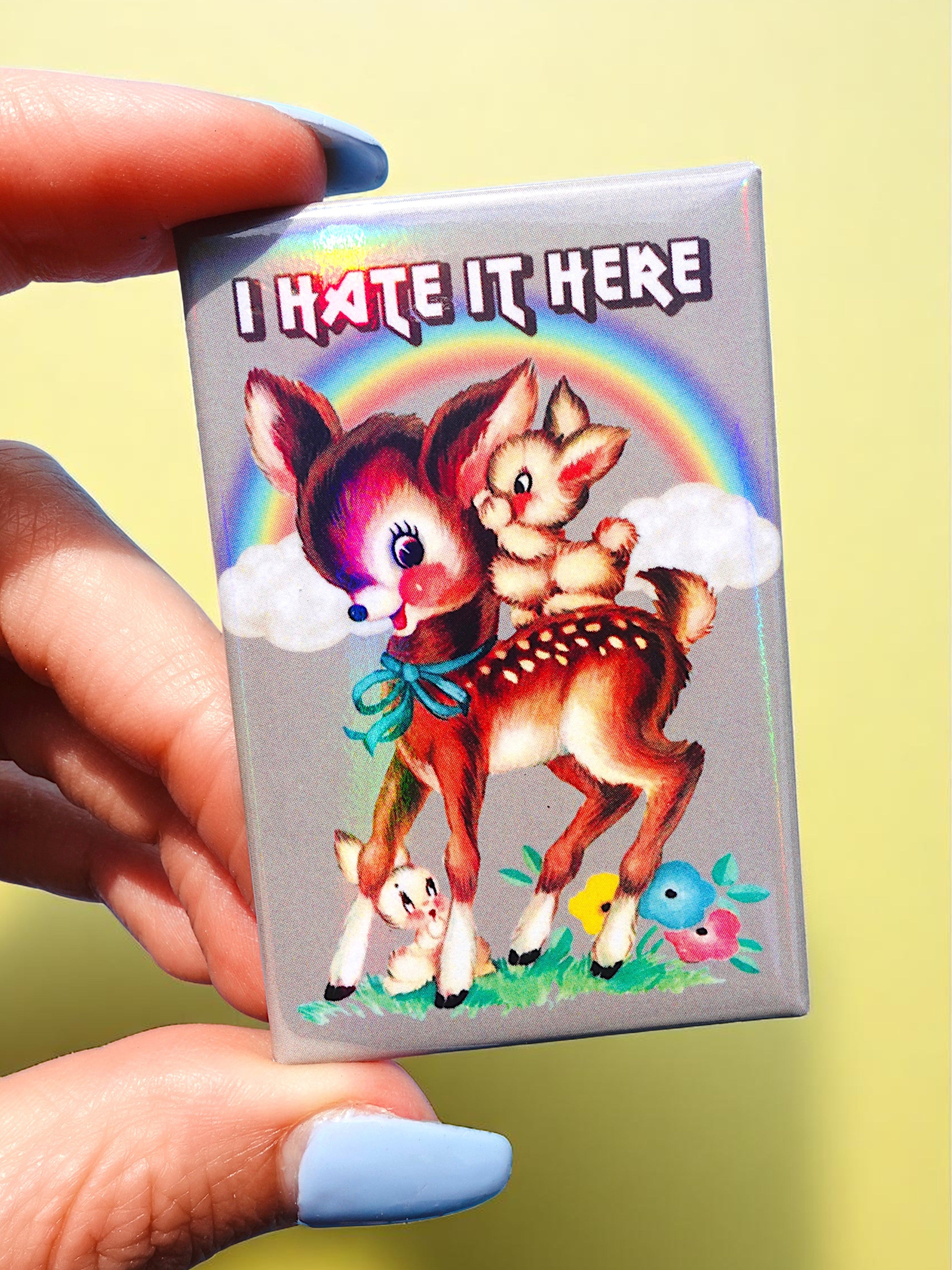 I Hate It Here Holographic Pin – Retro Rainbow Deer with Dark Humor