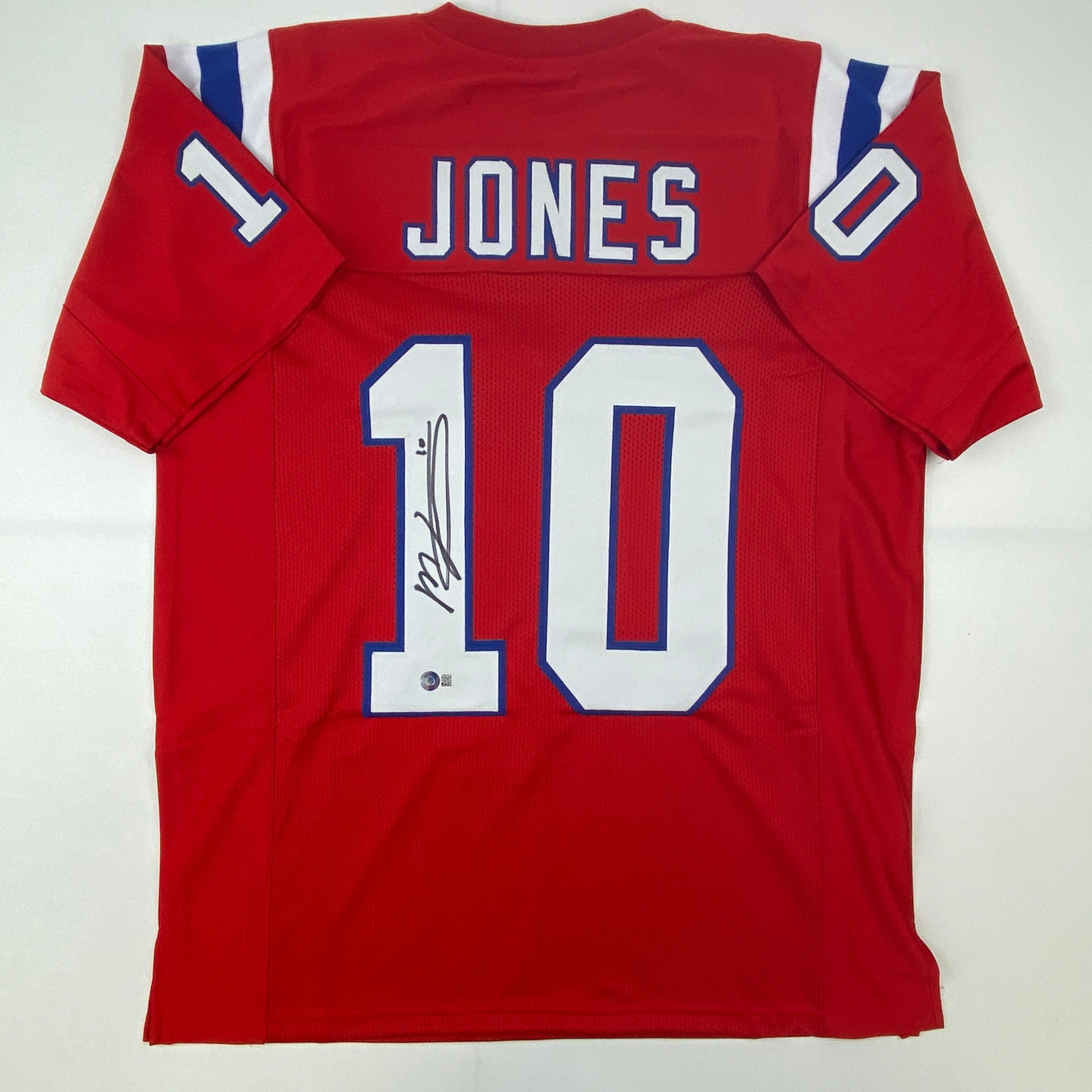 Autographed/Signed Mac Jones New England Red Football Jersey Beckett BAS COA