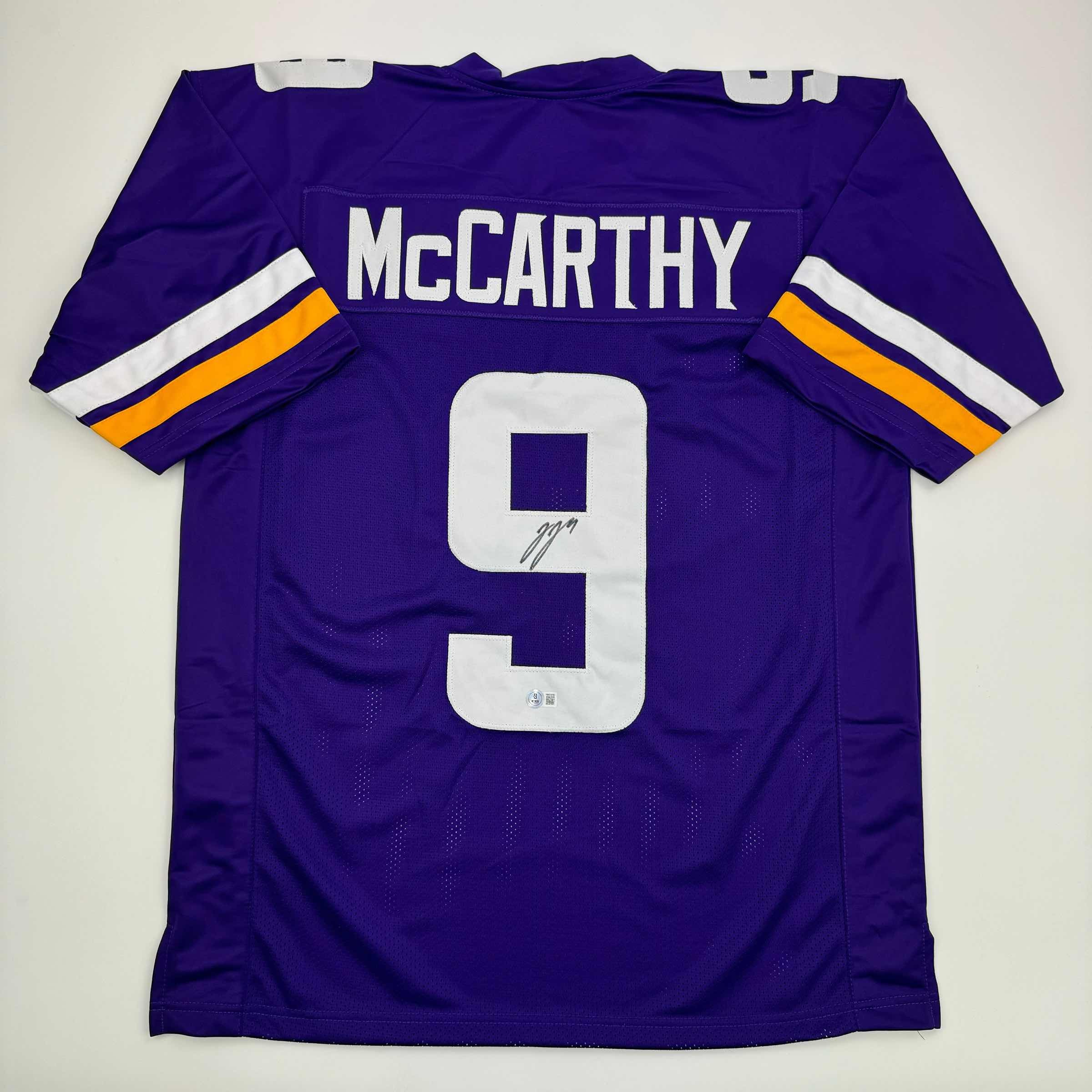Autographed/Signed J.J. JJ McCarthy Minnesota Purple Football Jersey Beckett BAS COA