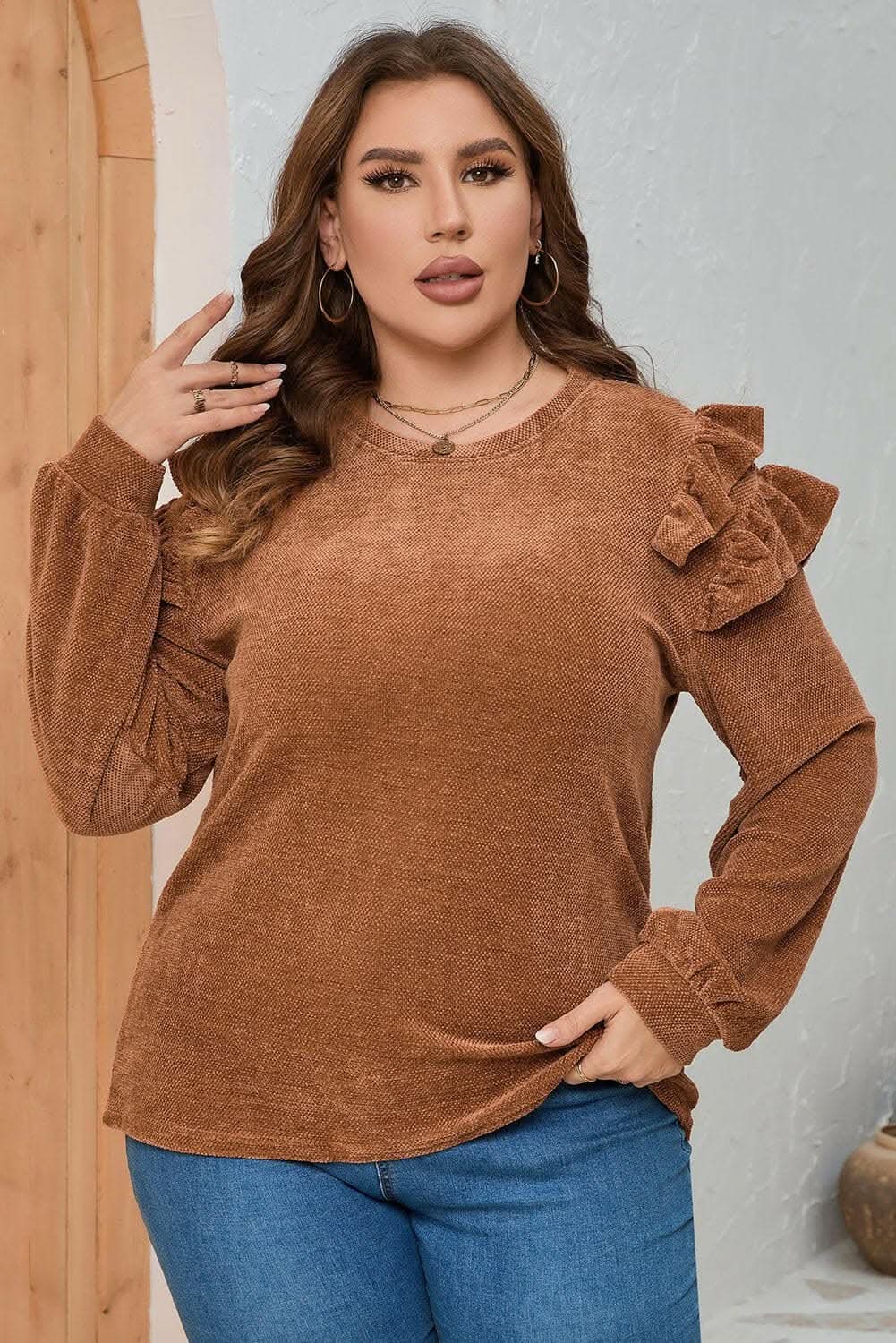 Plus size ruffled blouse in black