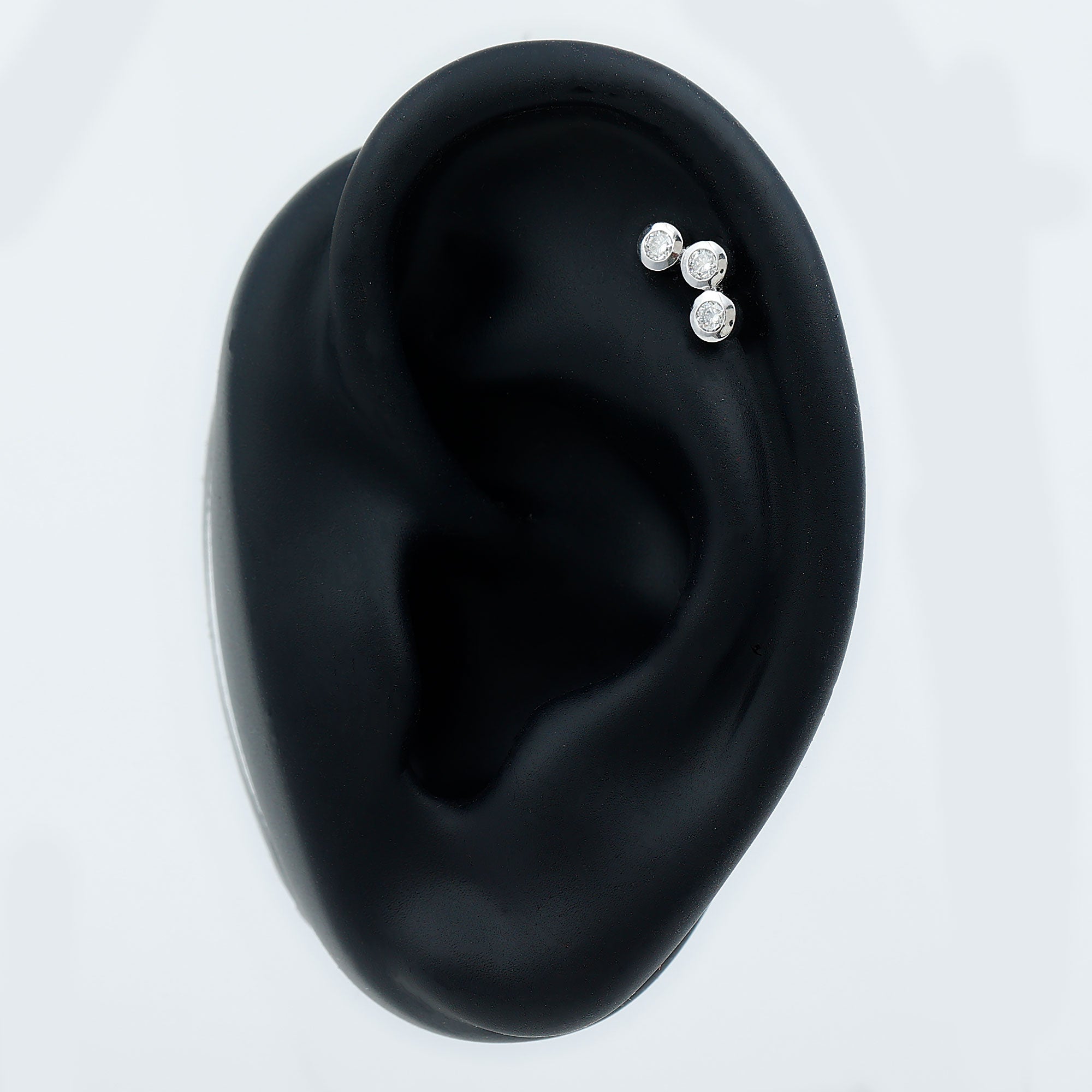 Three Diamond Curved Helix Earring in Bezel Setting