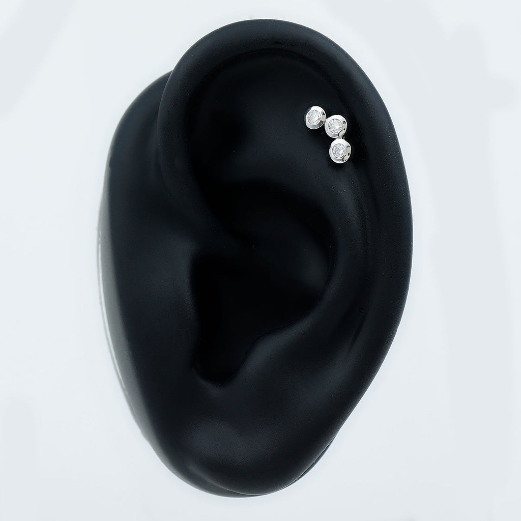 Three Diamond Curved Helix Earring in Bezel Setting