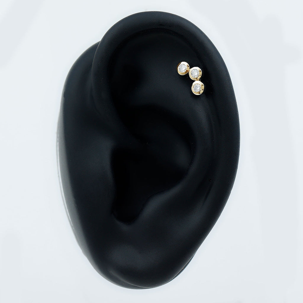 Three Diamond Curved Helix Earring in Bezel Setting