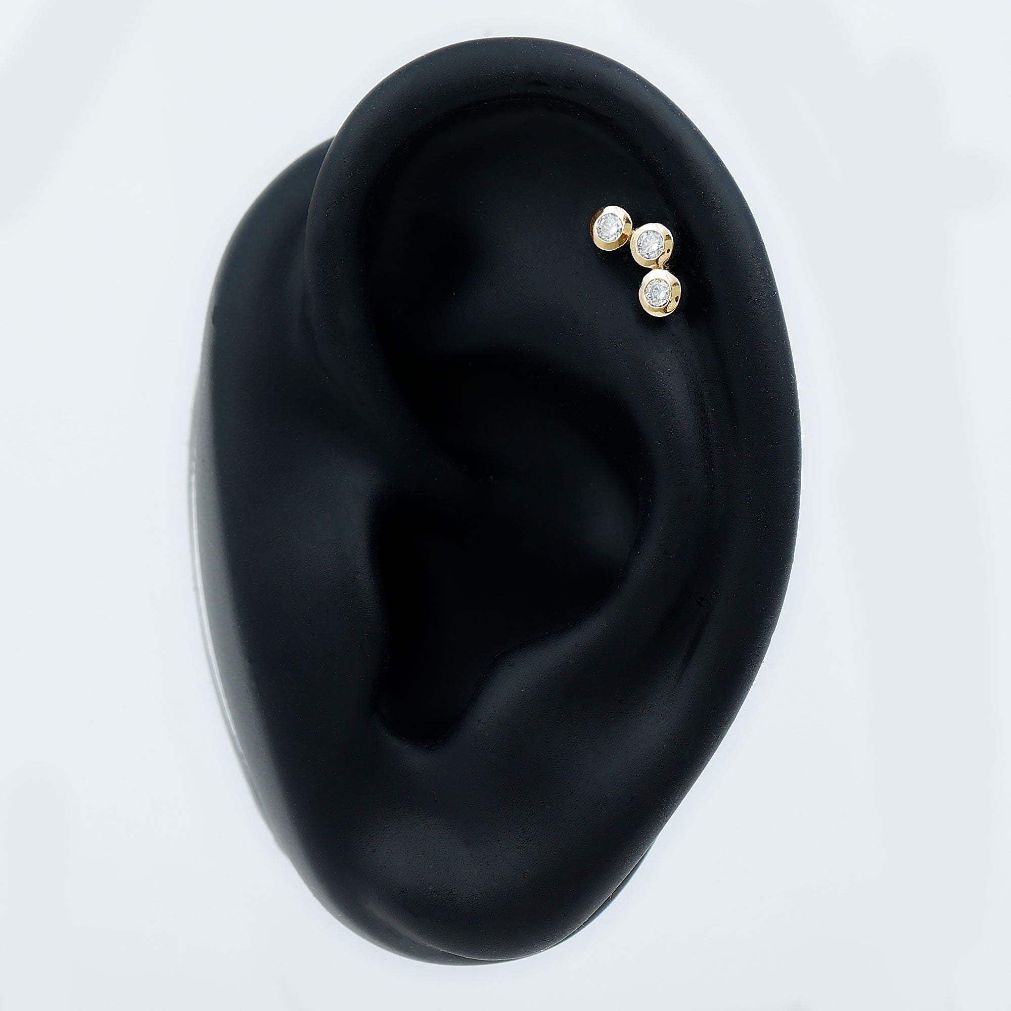 Three Diamond Curved Helix Earring in Bezel Setting