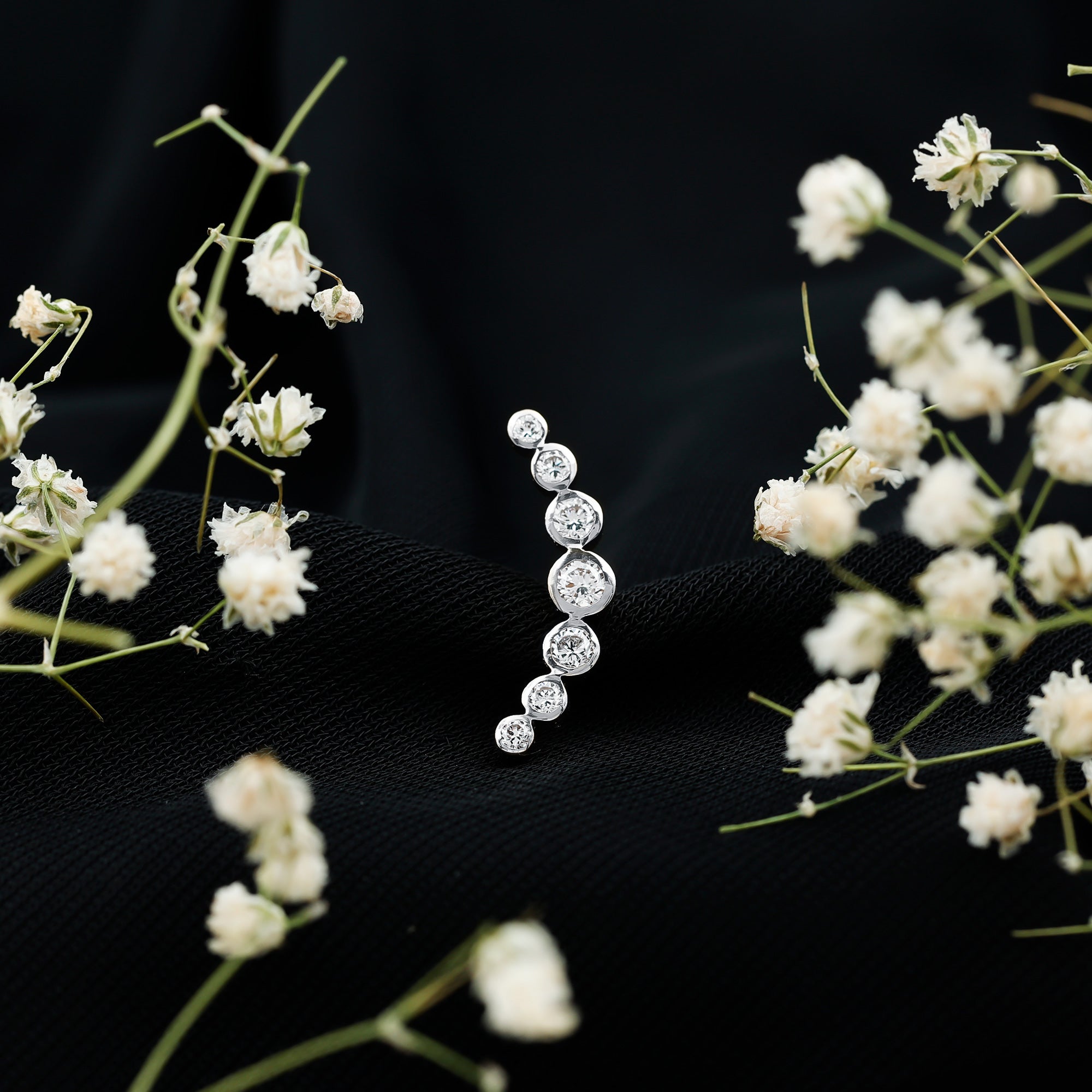 Graduated Bezel Set Moissanite Curved Crawler Earring