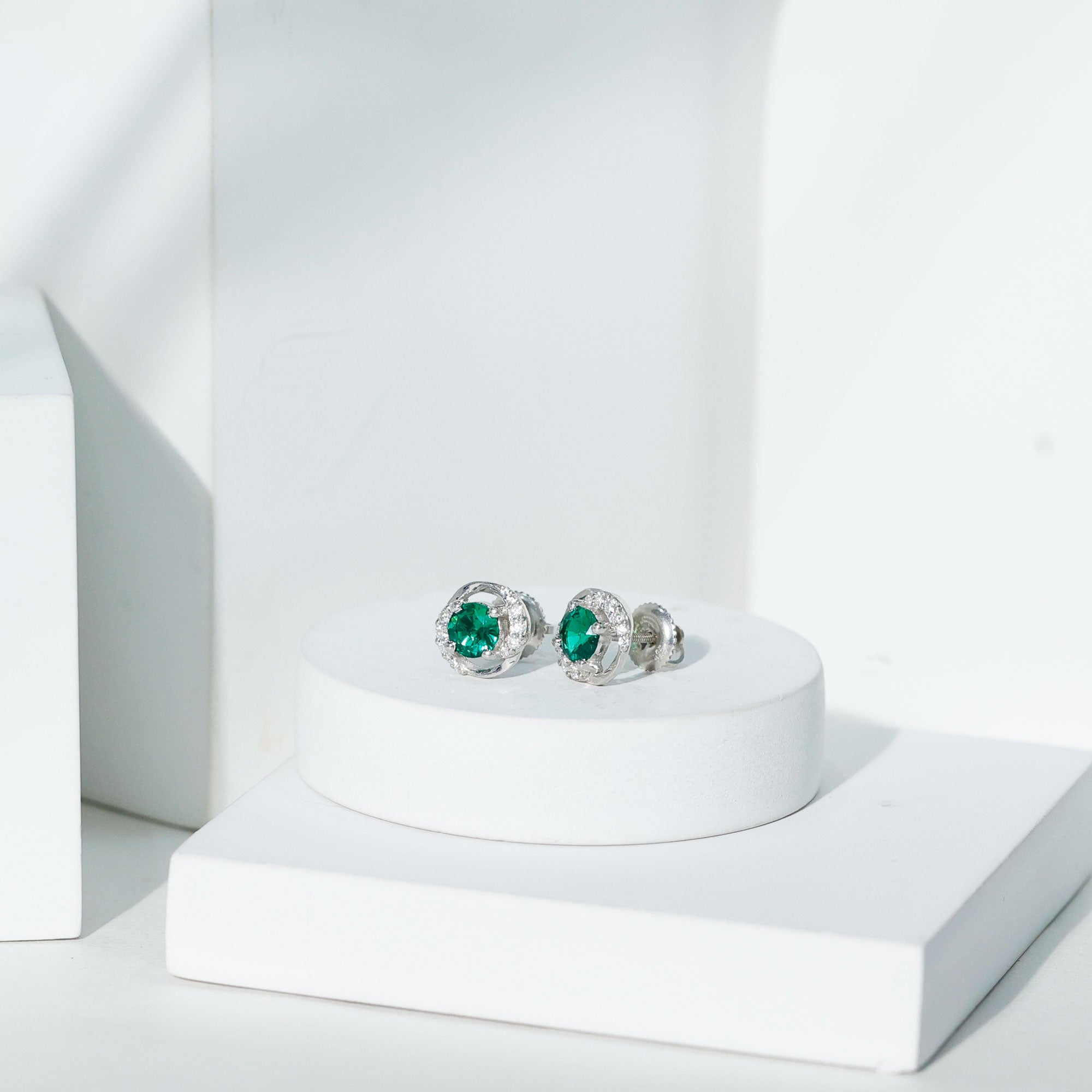 Certified 5 MM Lab Emerald Swirl Stud Earrings with Moissanite
