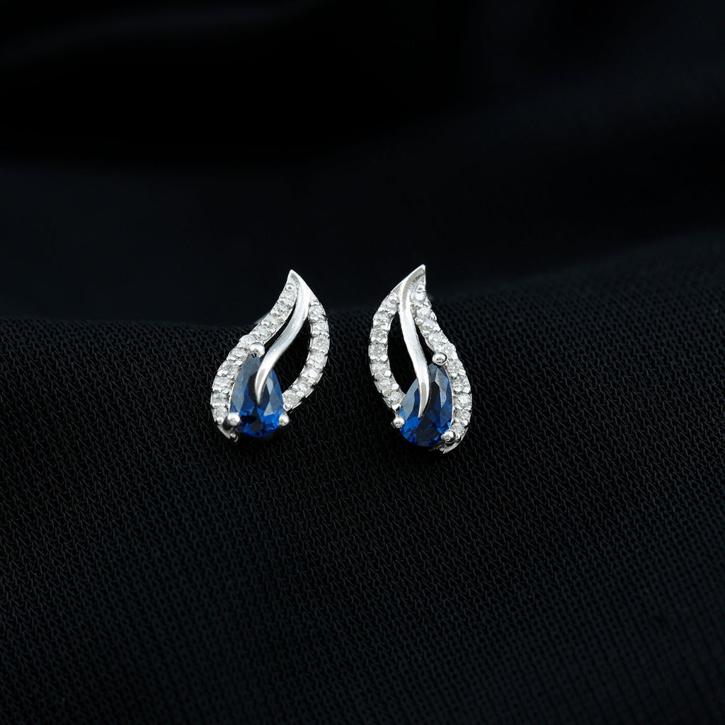 Lab Created Blue Sapphire Silver Leaf Stud Earrings with Moissanite