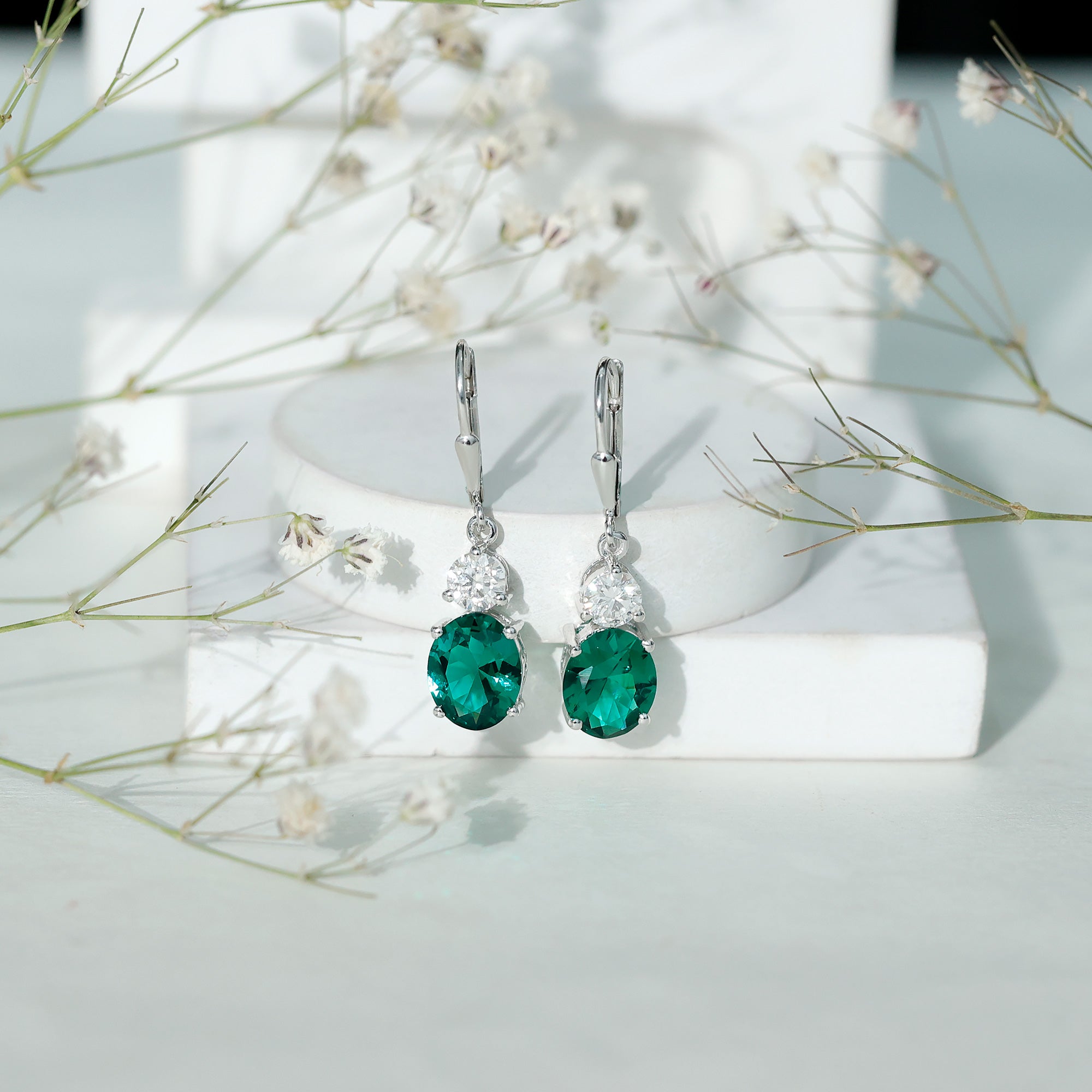 Oval Cut Lab Created Emerald and Moissanite Drop Hoop Earrings