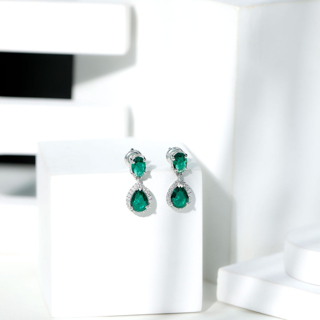 Oval and Pear Cut Lab Grown Emerald Bridal Earrings in Silver