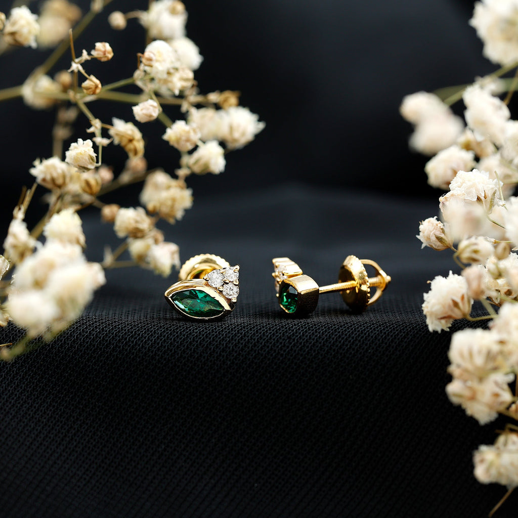 Marquise Cut Lab Grown Emerald Stud Earrings with Diamond Trio