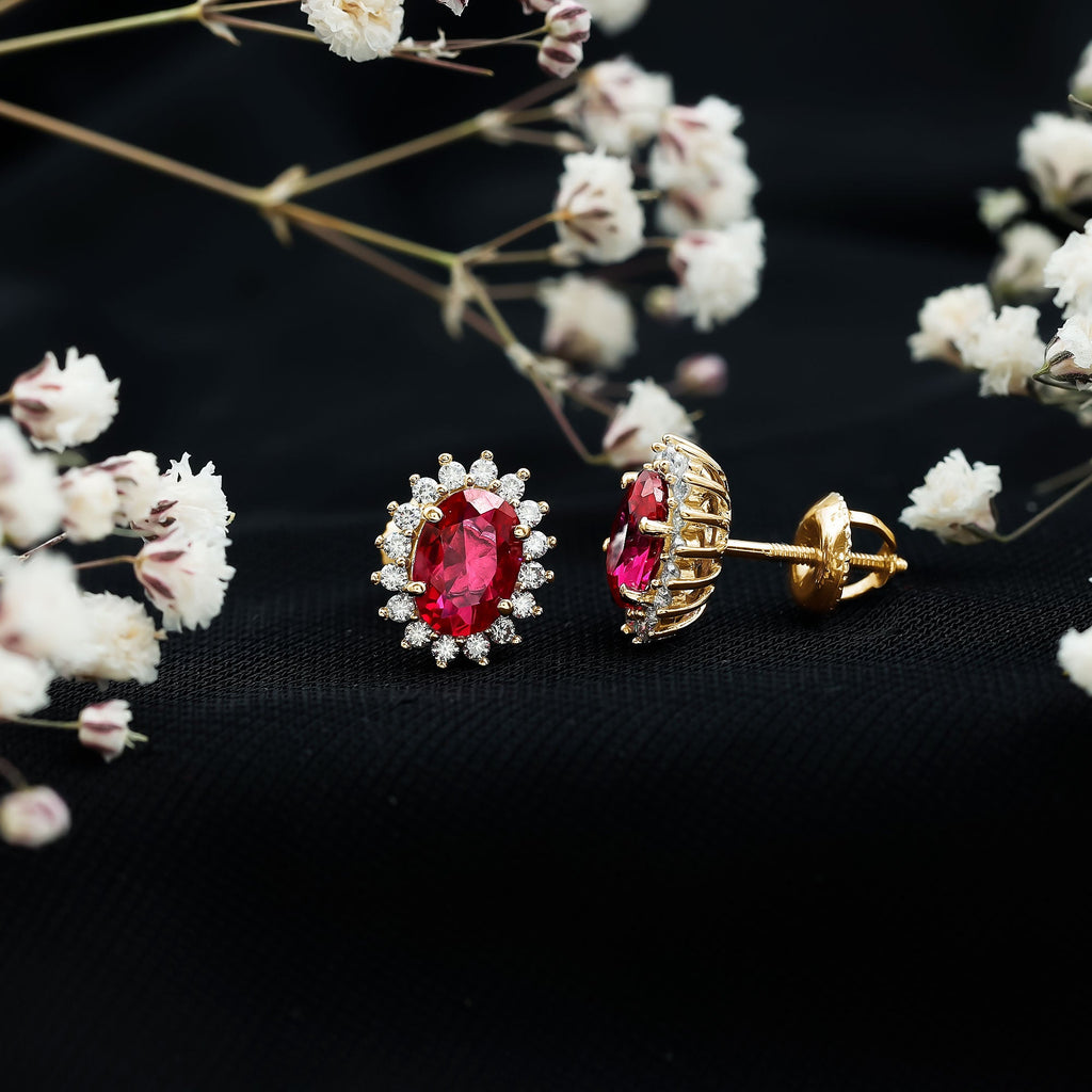 Oval Shaped Lab Created Ruby and Diamond Halo Stud Earrings