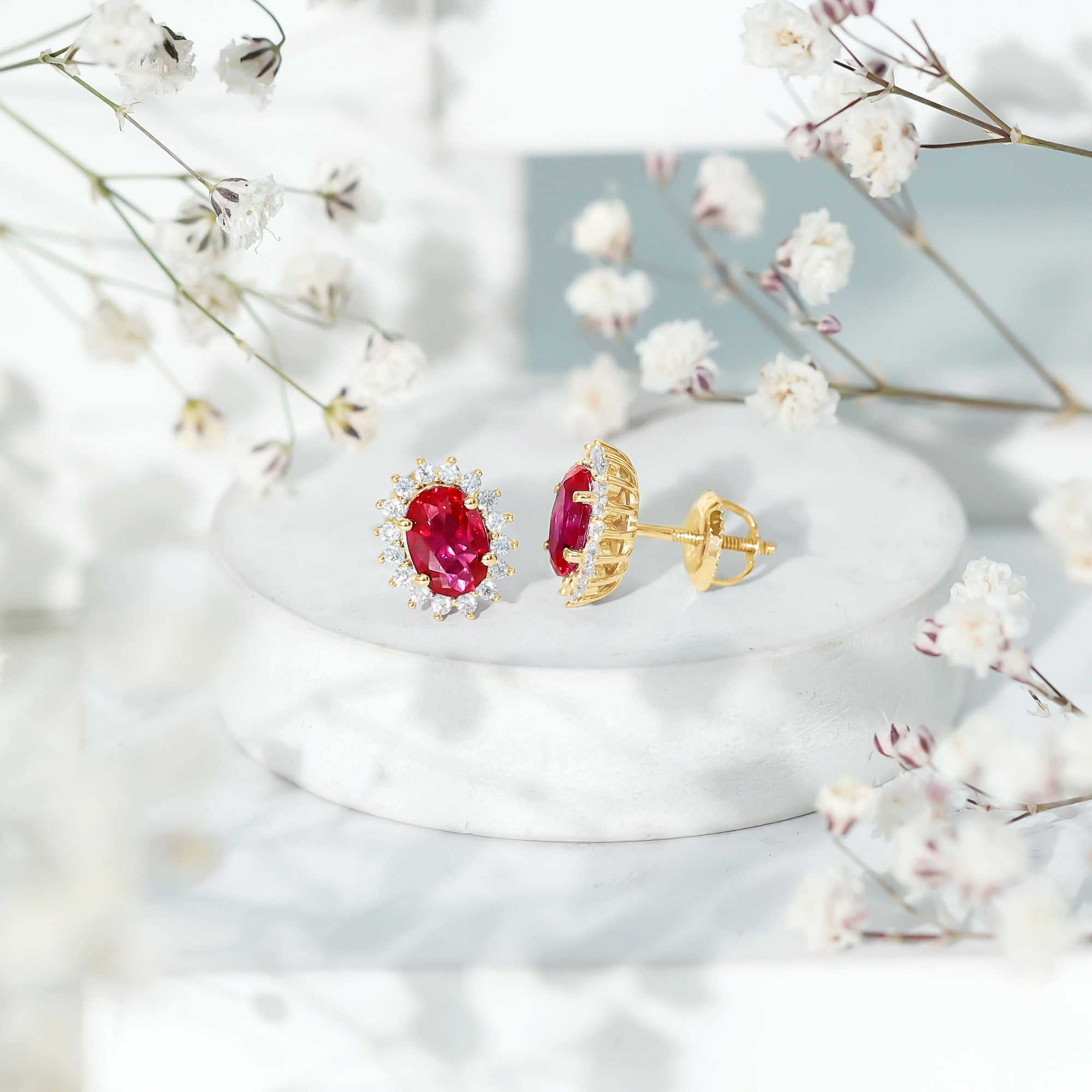 Oval Shaped Lab Created Ruby and Diamond Halo Stud Earrings