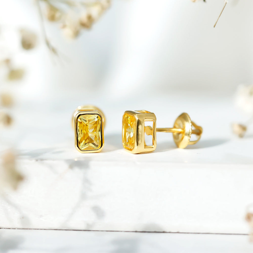 Bezel Set Lab Created Yellow Sapphire Emerald Cut Stud Earrings