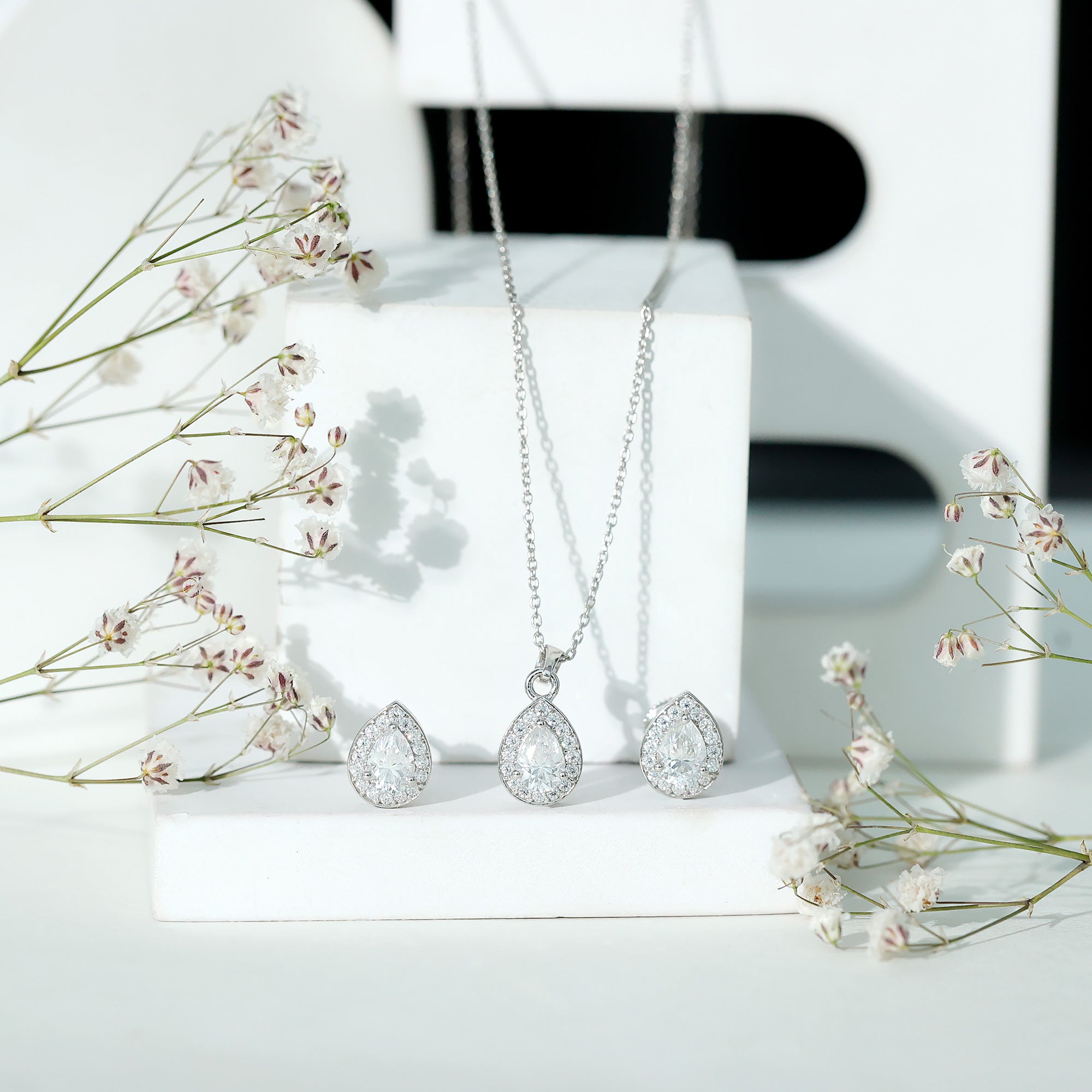 Pear Shaped Moissanite Halo Necklace and Earrings Set