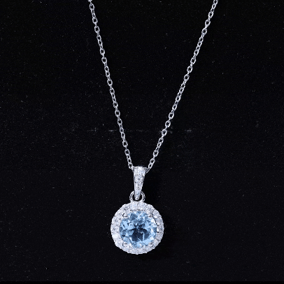 Round Cut 2 CT Sky Blue Topaz and Moissanite Halo Pendant Necklace