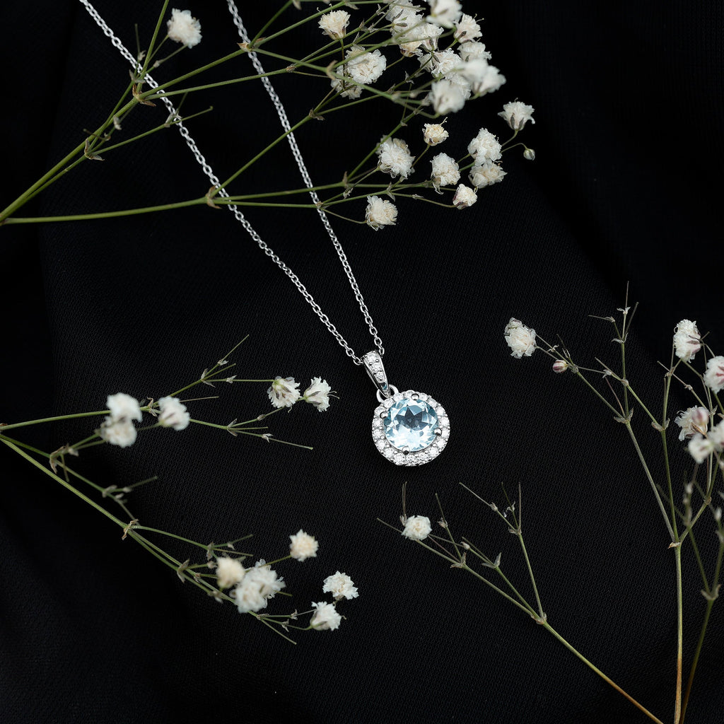 Round Cut 2 CT Sky Blue Topaz and Moissanite Halo Pendant Necklace