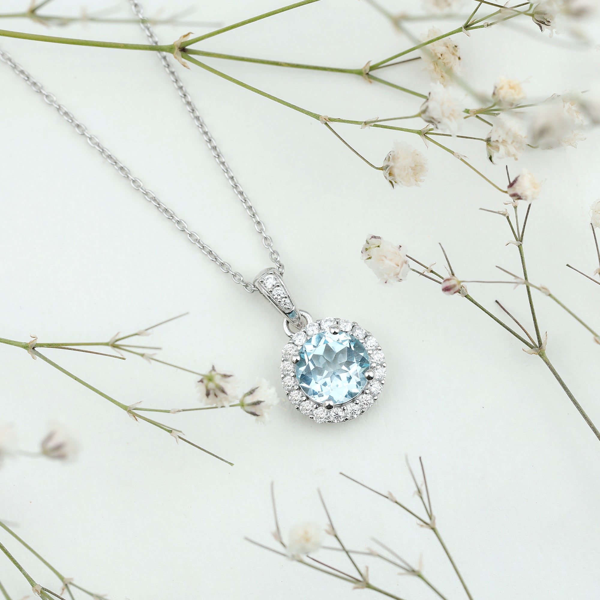 Round Cut 2 CT Sky Blue Topaz and Moissanite Halo Pendant Necklace