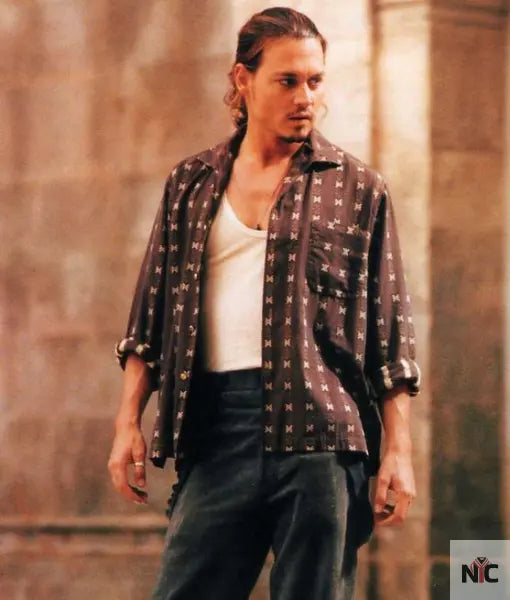 The Red­dish Shirt With White De­signs Worn by Roux (John­ny Depp) in Choco­lat