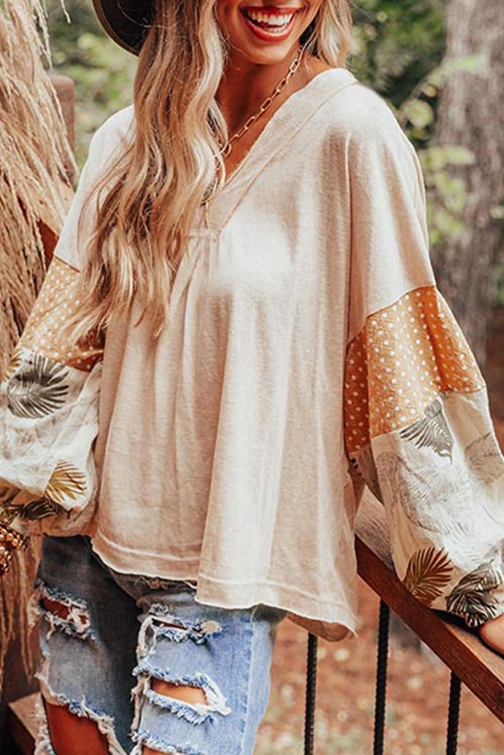 Chic palm print blouse with puff sleeves