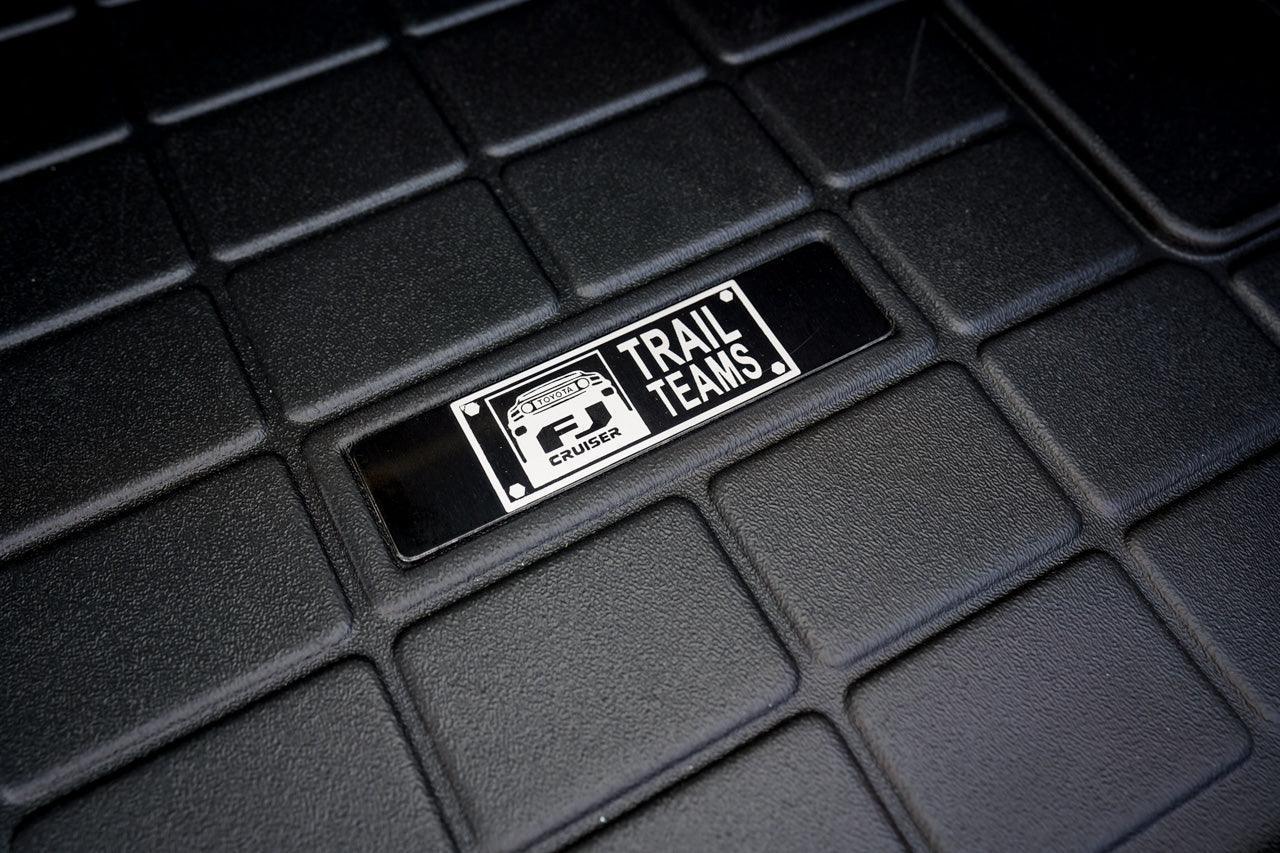 Toyota FJ Cruiser &amp;quot;Trail Teams&amp;quot; Weathertech Floor Mat Logo (Etched Metal) - Universal